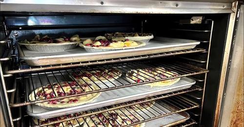 Pies in the oven baking at WMRHS